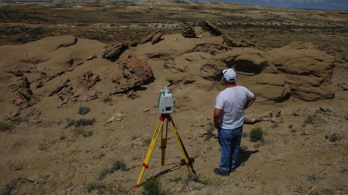 
Graduate student Tyler Jones, of Auburn University, sets up a LIDAR instrument in Wyoming's Great Divide Basin.

