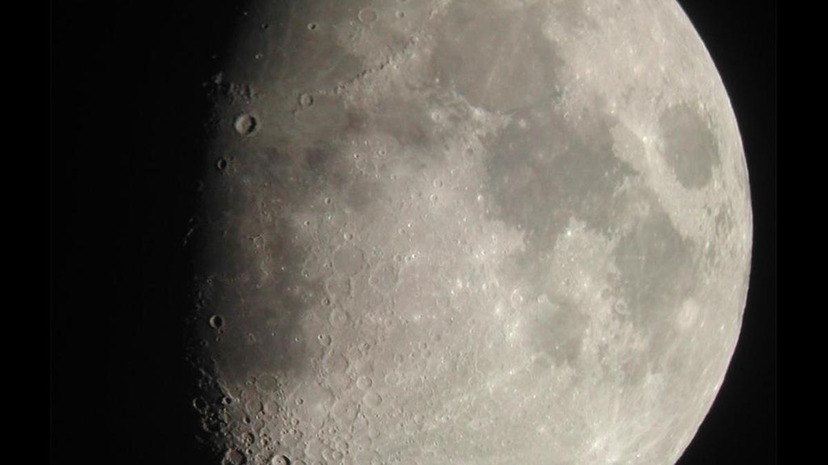 
The half-illuminated moon, often called a half moon, is a quarter of the way along its cycle from new moon (dark) to crescent moon to full moon (fully illuminated) and back again.
