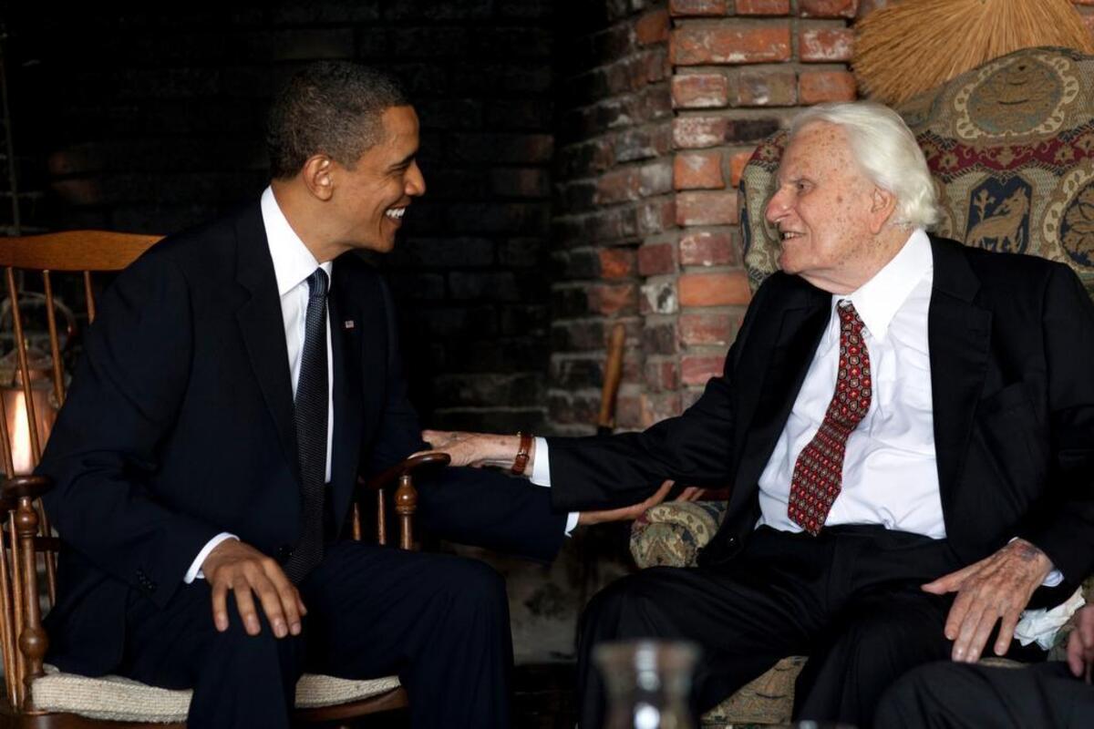 President Barack Obama talks with Graham, then 91, at the evangelist's home in Montreat.