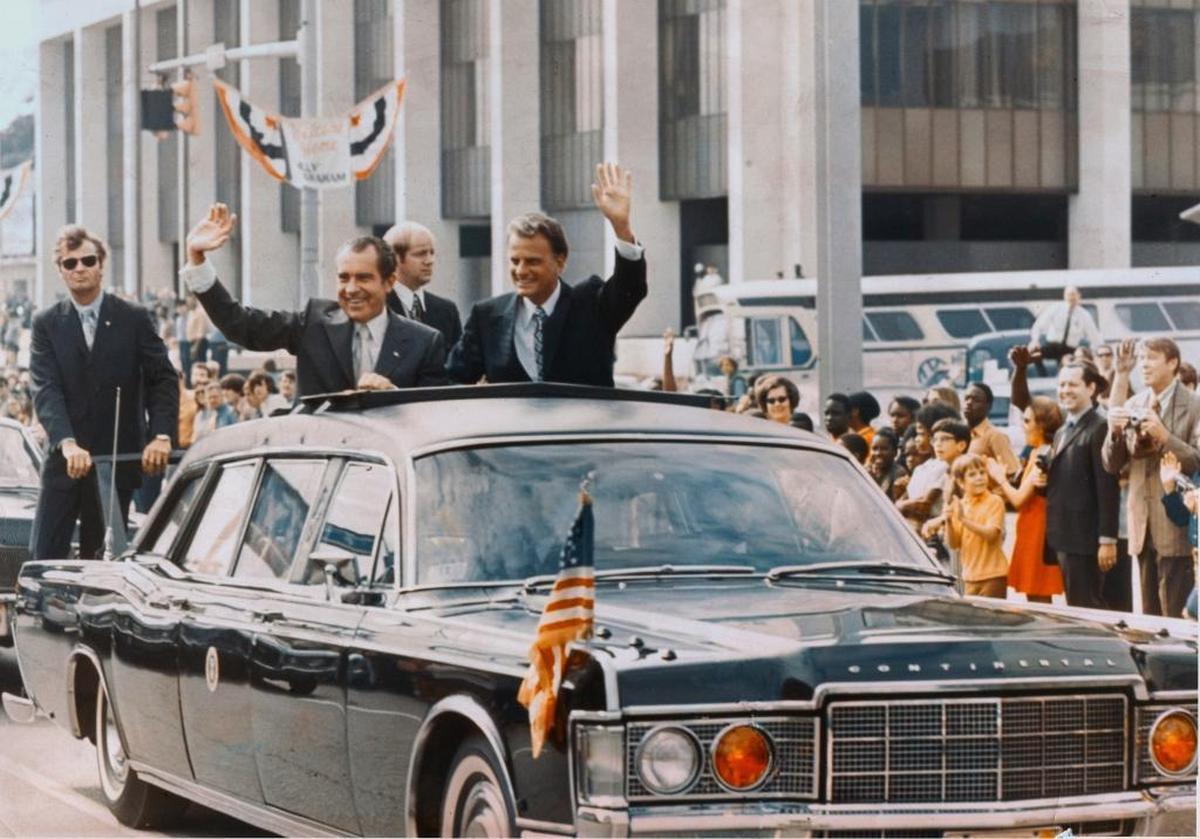 Don Sturkey took photos of President Richard Nixon and Billy Graham as they waved from their motorcade on Tryon Street on Oct. 15, 1971.