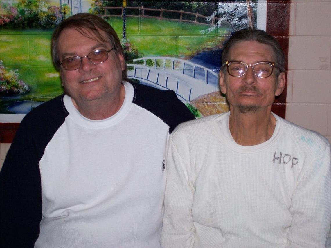 Richard “Grasshopper” Liggett, right, with his brother John Liggett, during a visit at Angola prison in Louisiana. Richard Liggett was a master carpenter at Angola who built caskets. His name is one of three burned into the wood on Rev. Billy Graham’s casket.