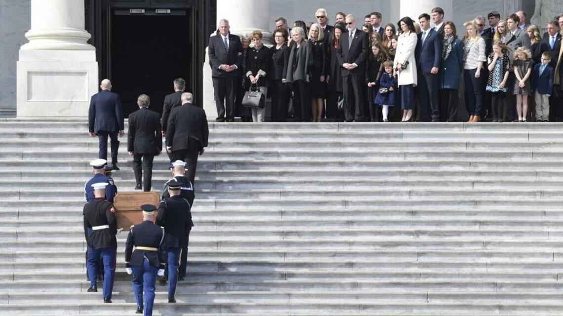 Trump praises Graham as evangelist’s body lies in honor in Capitol Rotunda