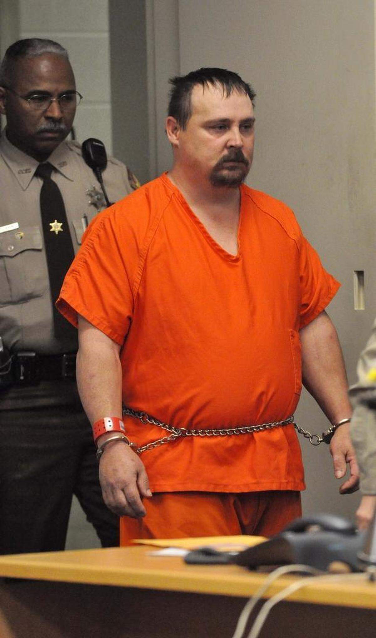 Mark Carver enters the courtroom. “I’m 100 percent sure we got the right guy,” Detective Derek Terry said after the N.C. Center on Actual Innocence took on Carver’s case.