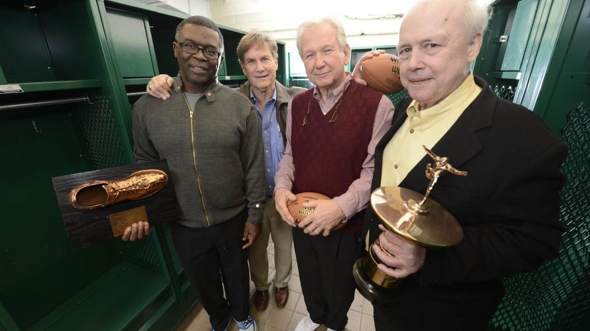 Myers Park High School's 1965 championship football team -- including stars Jimmie Lee Kirkpatrick (left), Neb Hayden, Mack Tharpe and Harris Woodside -- gathered for a reunion in January 2013.