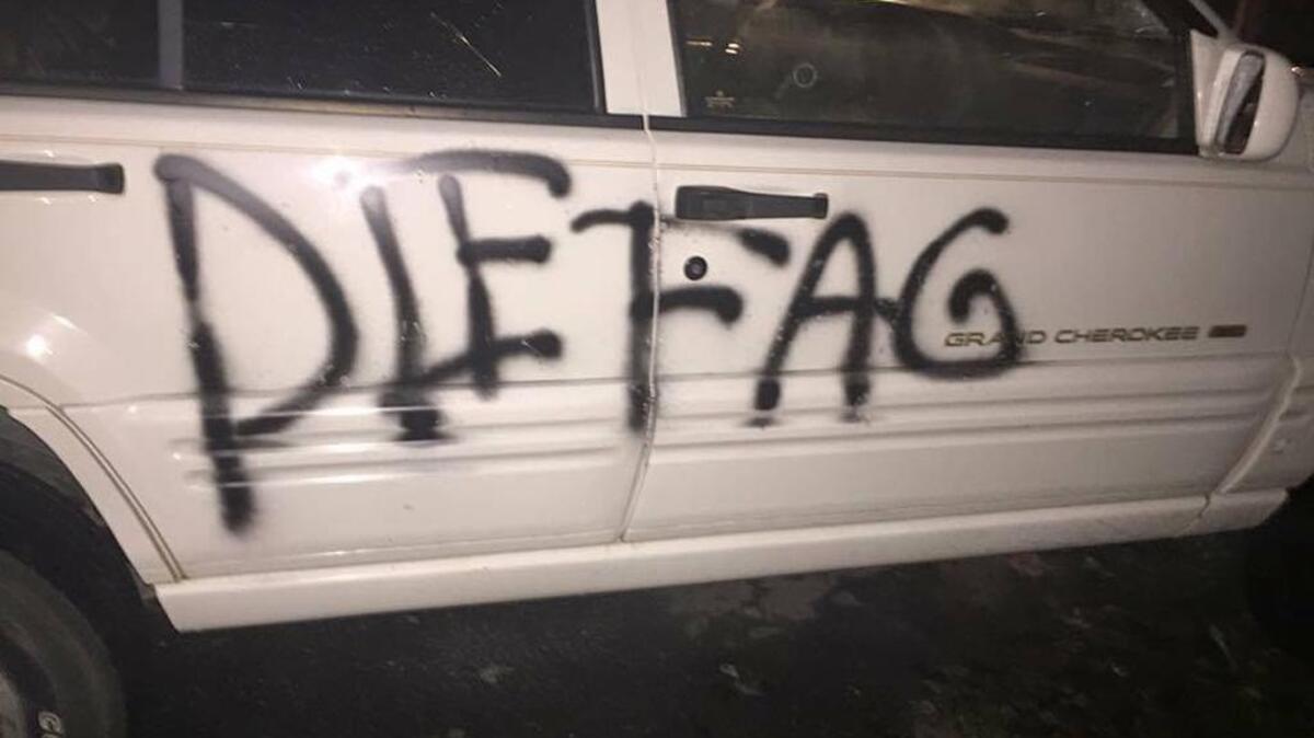 After leaving work at Little Caesar’s Pizza restaurant late one night in Waynesville in the Smokey Mountains, Andrew Windham-Harris discovered a death threat spray-painted in huge black letters across the passenger side of his white Jeep Grand Cherokee.