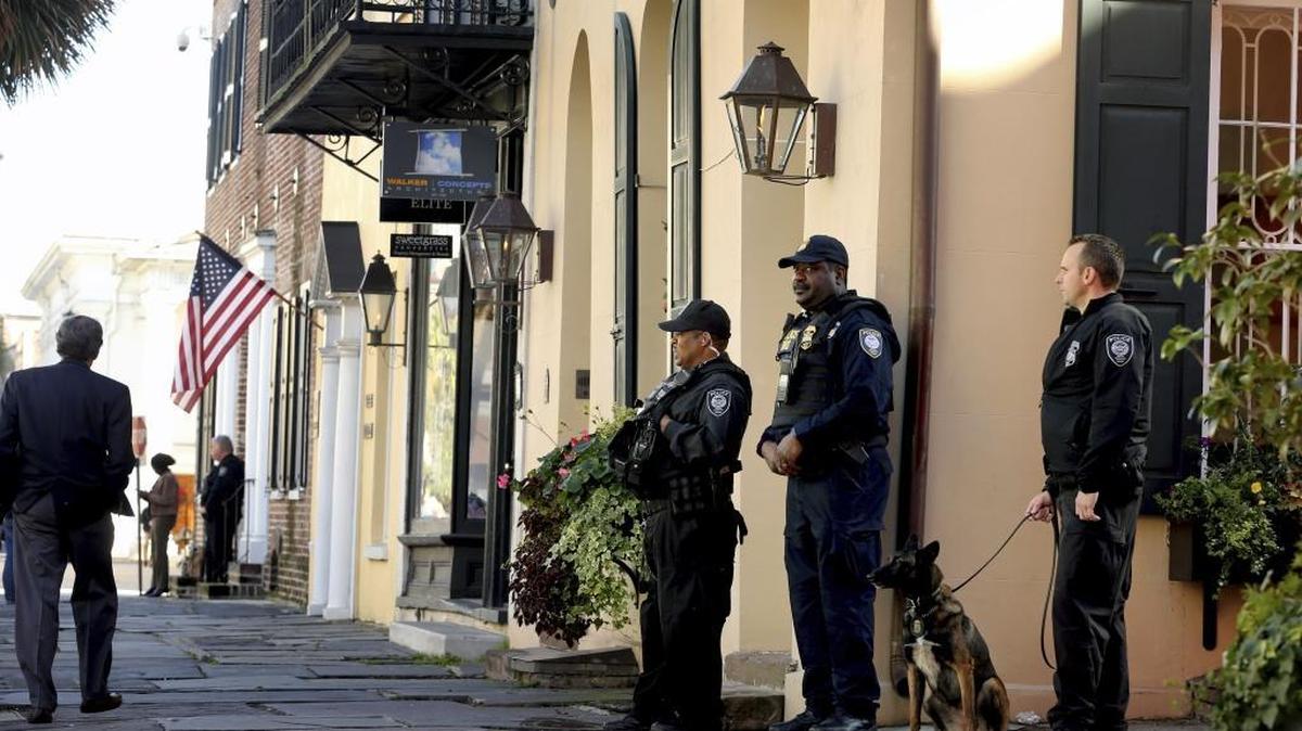 Homeland Security patrols the streets outside the federal courthouse Wednesday in Charleston, S.C., during Dylann Roof’s trial. Roof, a white man, is accused of killing nine black people at a church.