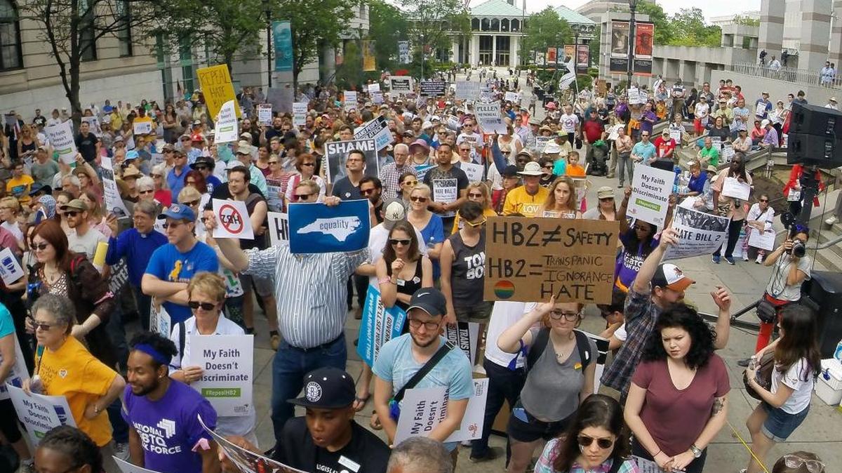 Several hundred supporters crowd the Bicentennial Mall in Raleigh on Monday in support of repealing HB 2.