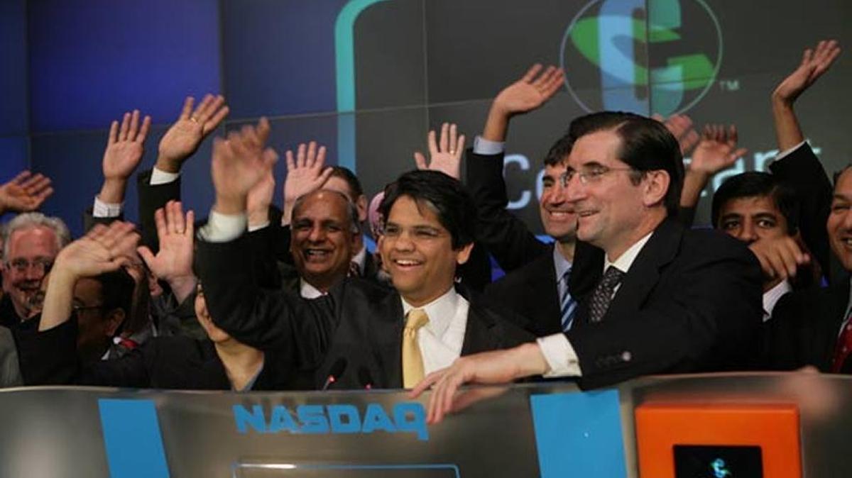 The IT and consulting company Cognizant Technology Solutions will add 300 jobs in Charlotte, thanks in part to an incentives package of over $2.1 million from the city, county and state. Pictured here (center) is the company’s president and CEO, Francisco D’Souza.
