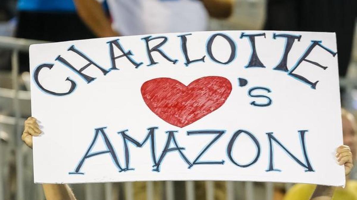 A Panthers fan shows his support for Amazon bringing a headquarters to Charlotte.