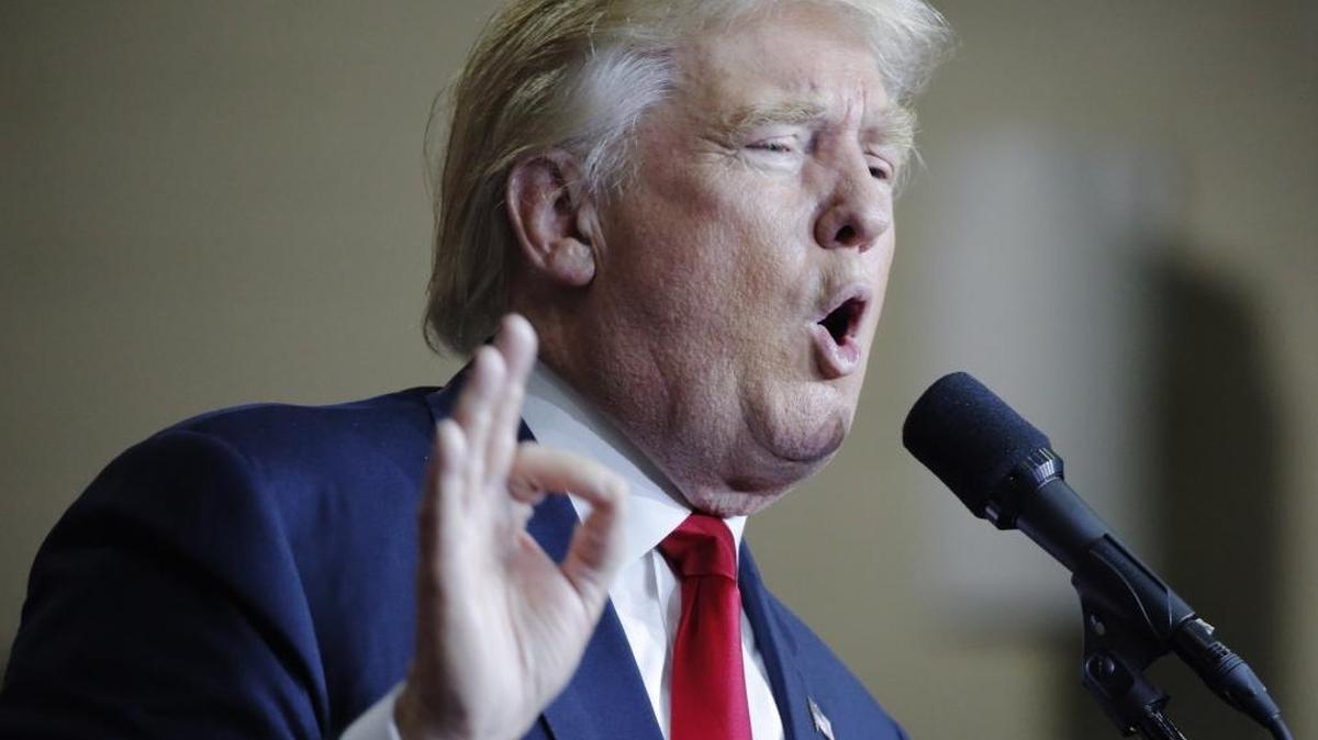 GOP presidential nominee Donald Trump speaks at a recent campaign rally. He is feuding with key GOP leaders.