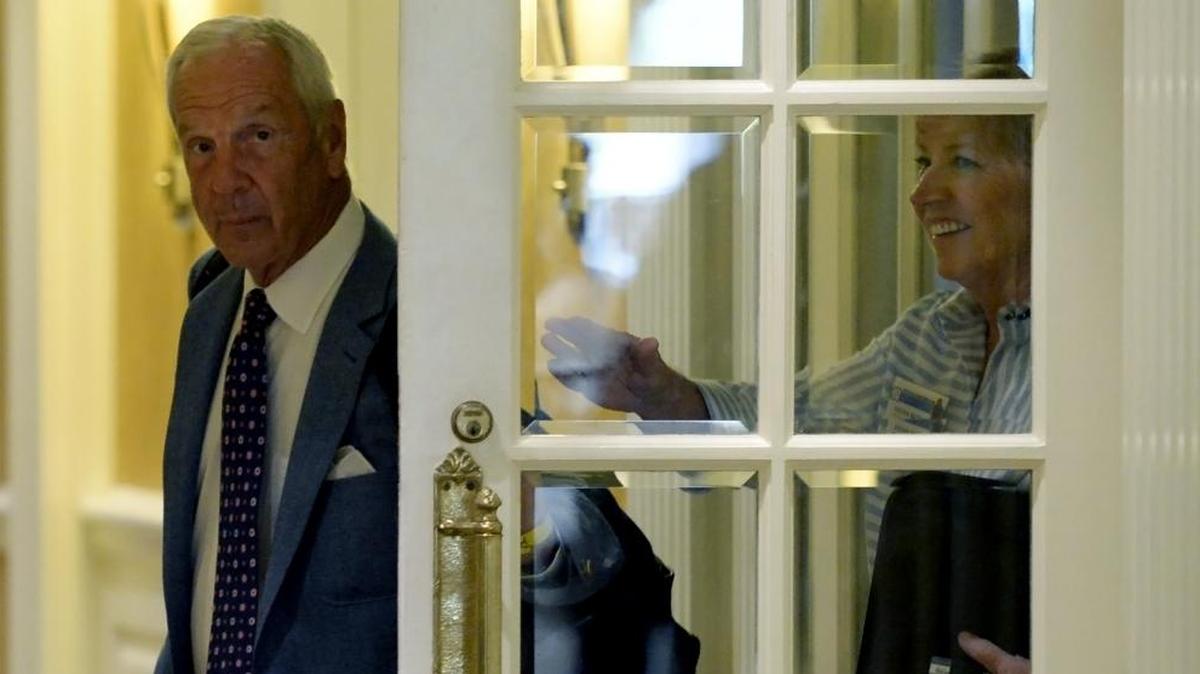 University of North Carolina basketball coach Roy Williams and women’s coach Sylvia Hatchell leave for a break during an NCAA hearing in August.
