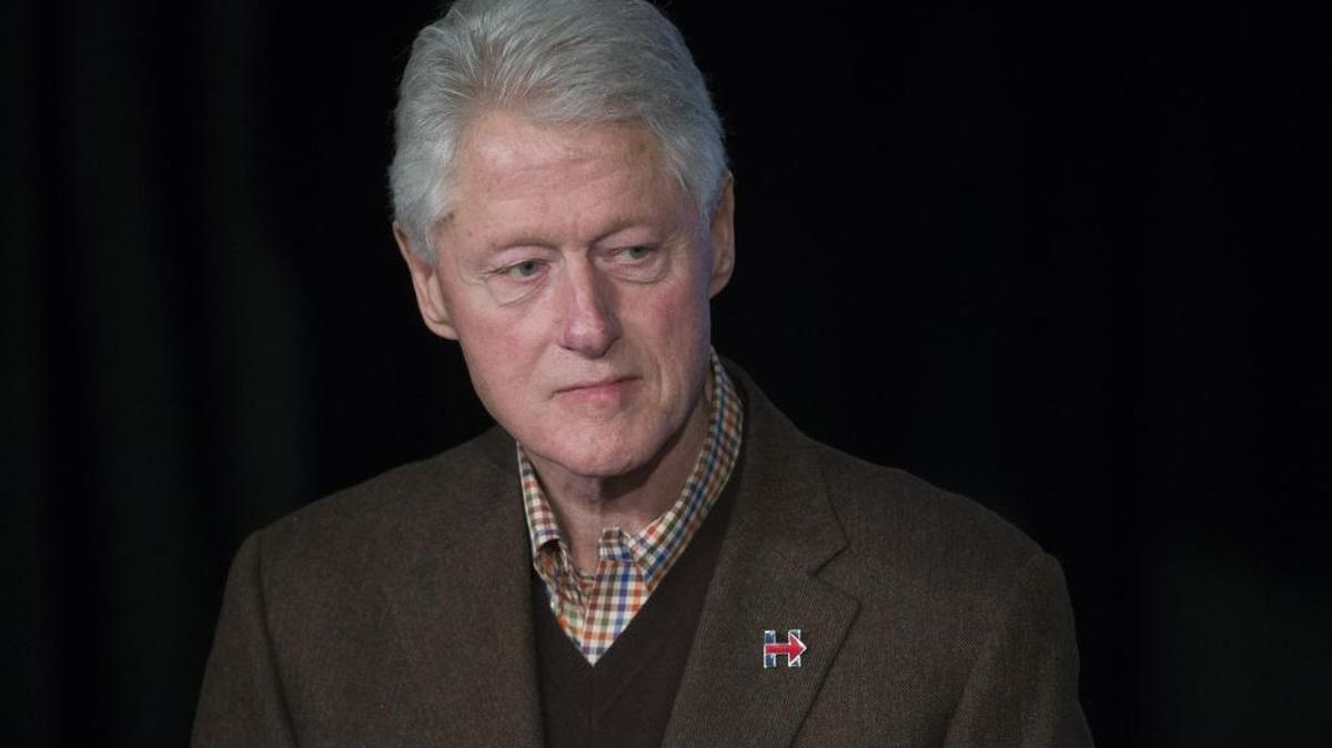 Bill Clinton was unusually reserved at campaign stops in New Hampshire on Monday.