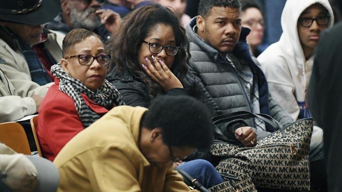A crowd listens last week at an Asheville Citizens Police Action Committee meeting on a beating of a black man by a city police officer.