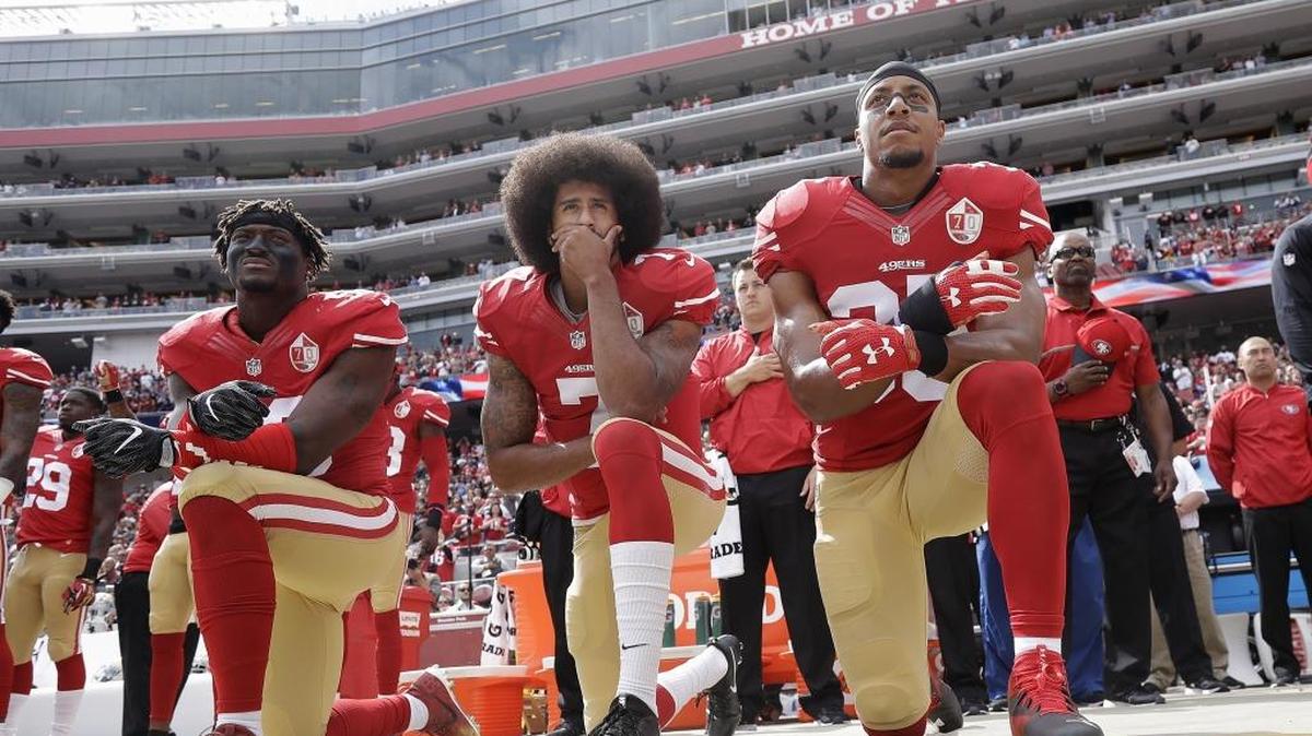 Colin Kaepernick and two others knelt during the national anthem last October.