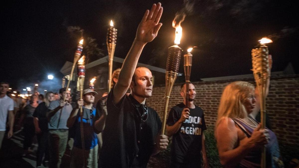 Chanting “Jews will not replace us!” several hundred white nationalists and white supremacists carrying torches marched in a parade through the University of Virginia campus on Aug. 11.