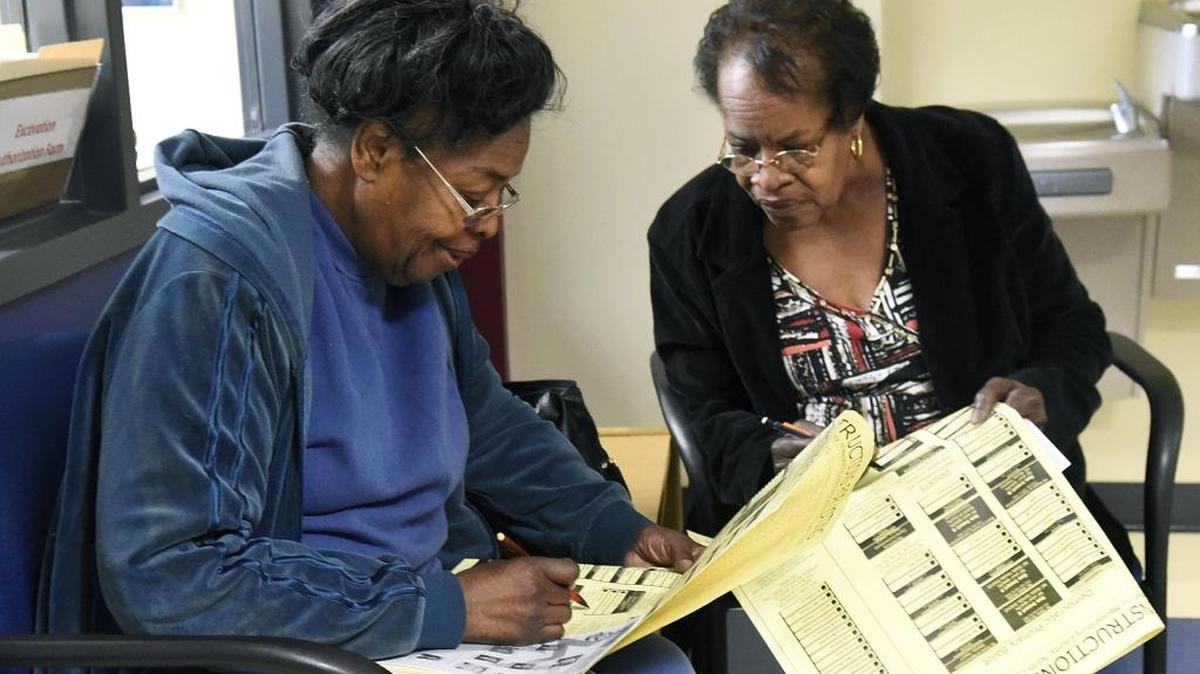 Sisters Marie McCombs (left) and Mary Anne Casey voted early in the March primary this year.