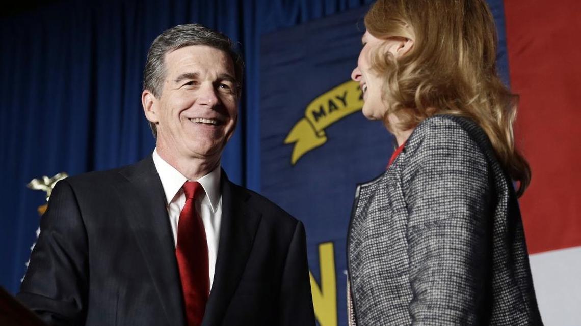 Roy Cooper and his wife Kristin on election night in Raleigh.