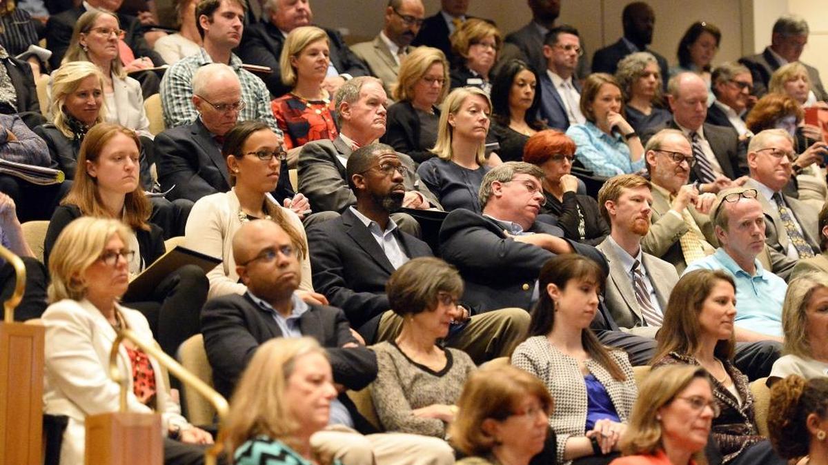 Audience members listen during the Charlotte-Mecklenburg Opportunity Task Force presentation in March.