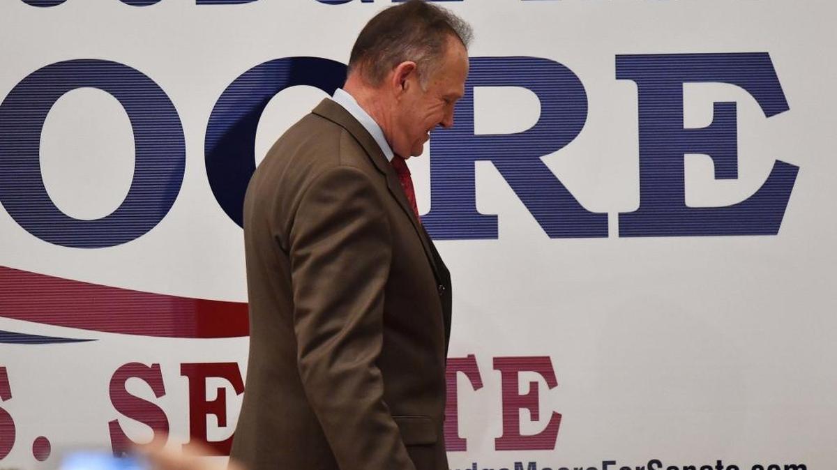U.S. Senate candidate Roy Moore leaves the stage Tuesday at the end of his election-night watch party in Montgomery.