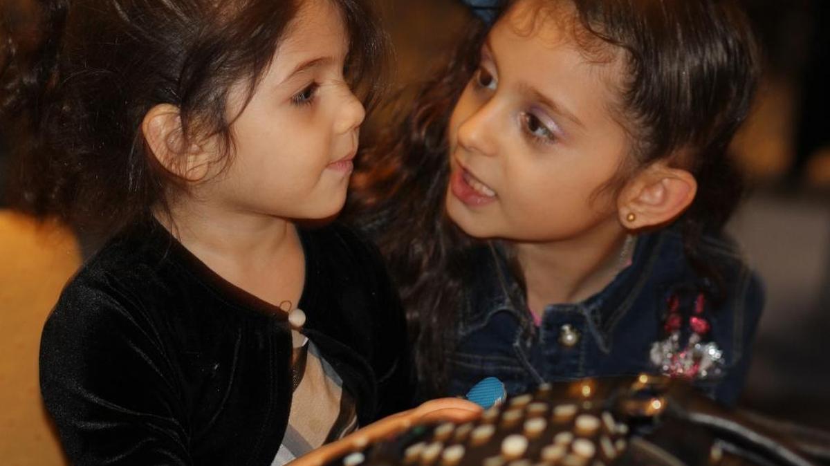 When they see kids without toys, these girls from Syria want to give them all their toys.