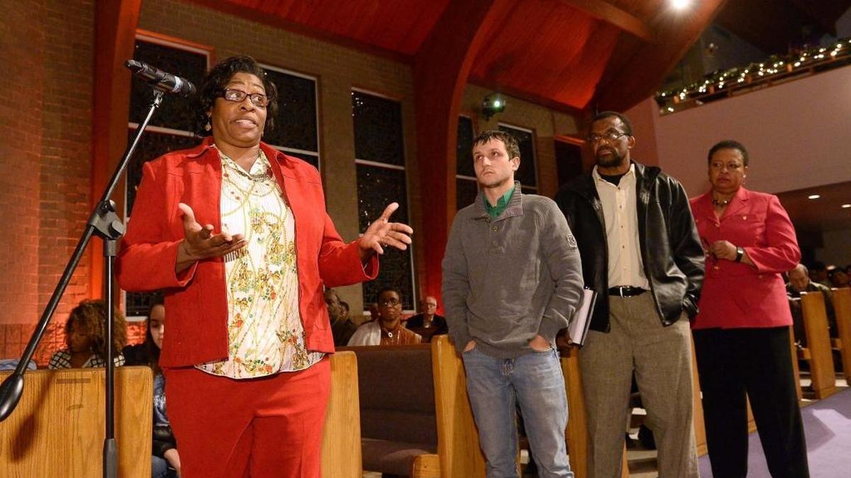 Community member Tammy Hill tells the audience “the school to prison pipeline needs to end” at a Charlotte-Mecklenburg Opportunity Task Force town hall meeting in 2015.
