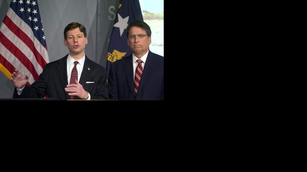 
State Budget Director Lee Roberts and N.C. Governor Pat McCrory unveil the governor’s 2015-17 budget Thursday. 
