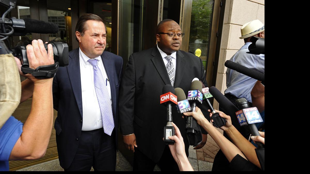 
Attorneys George Laughrun (left) and Michael Greene.
