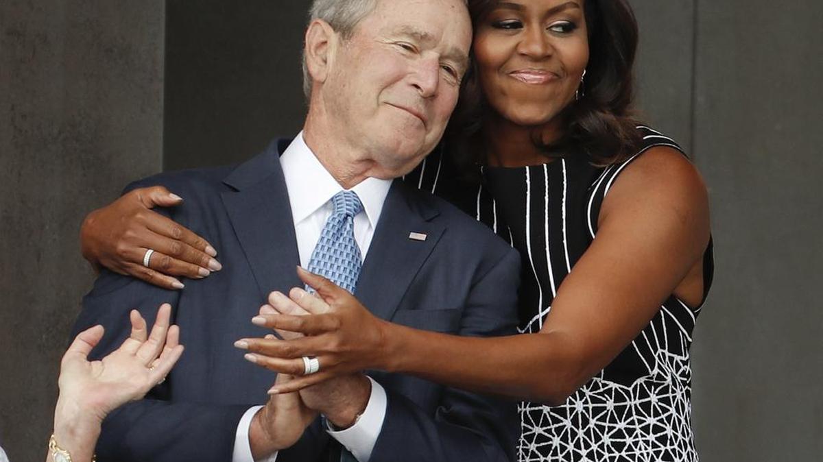 Michelle Obama and George W. Bush during the dedication ceremony for the Smithsonian Museum of African American History and Culture in September.