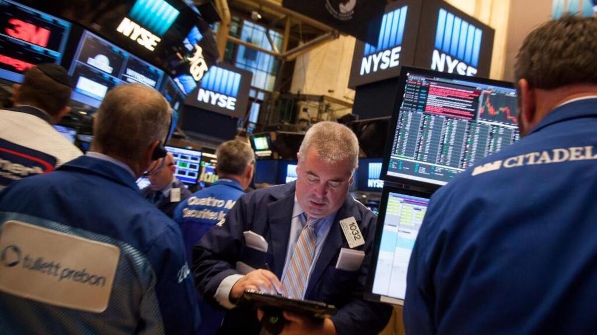 U.S. stocks fluctuated in whipsaw trading Friday, with the Dow Jones Industrial Average spinning near a record.