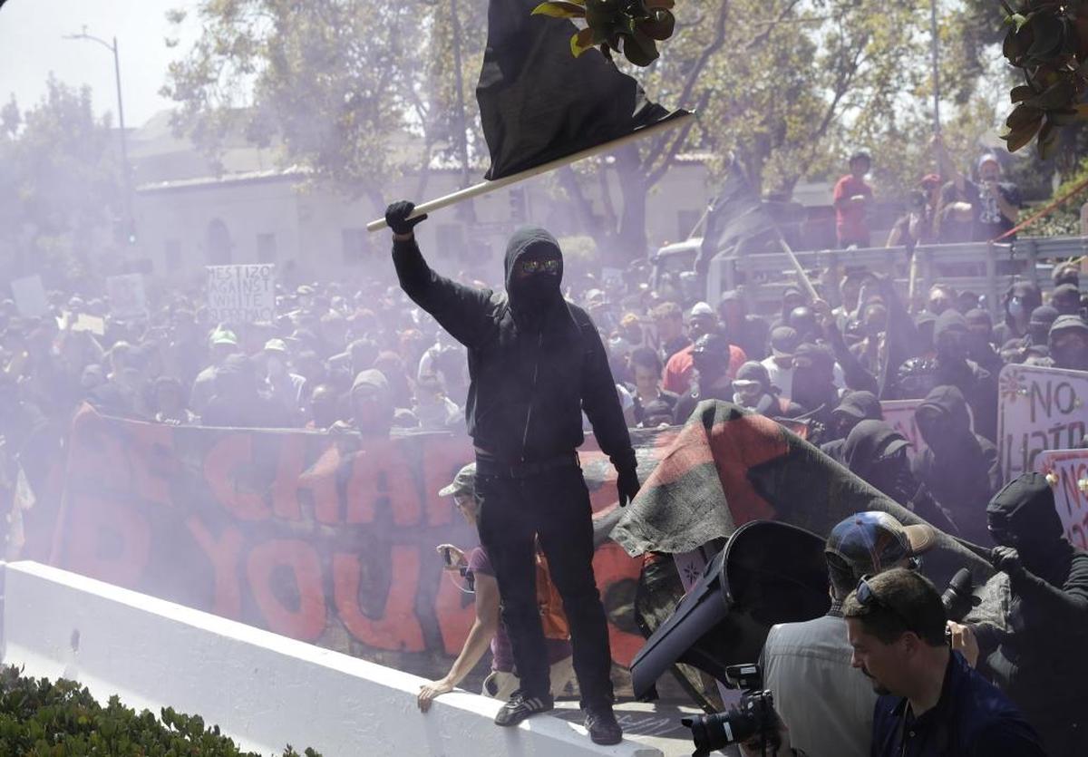 An anti-fascist demonstrator during a free speech rally Sunday in Berkeley, Calif.