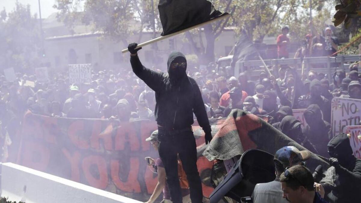 An anti-fascist demonstrator during a free speech rally Sunday in Berkeley, Calif.