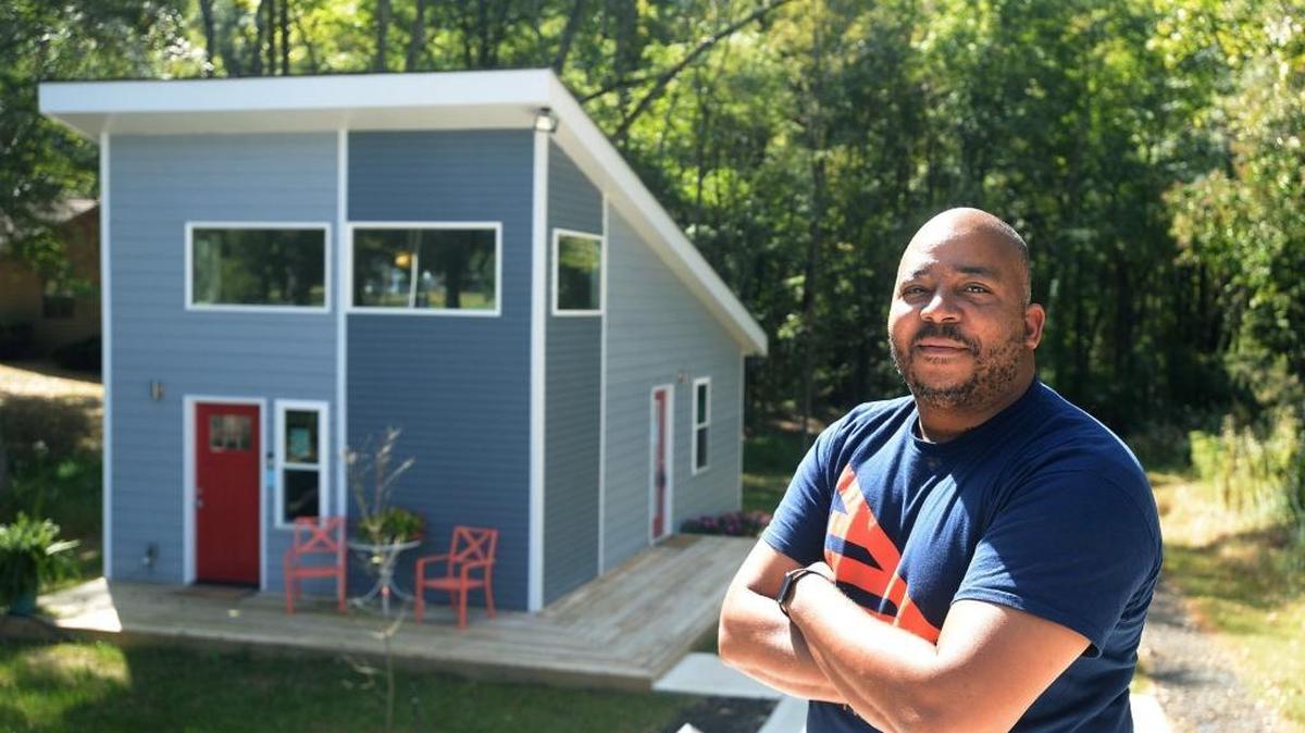 Developer Kevin Young in front of a model tiny house at his tiny house development in northwest Charlotte. Keyo Park West won’t move forward with construction, an attorney for the project said.