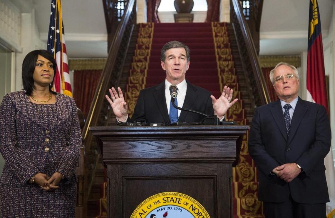 N.C. Gov. Roy Cooper picked Tony Copeland, right, to lead the Department of Commerce in 2017.