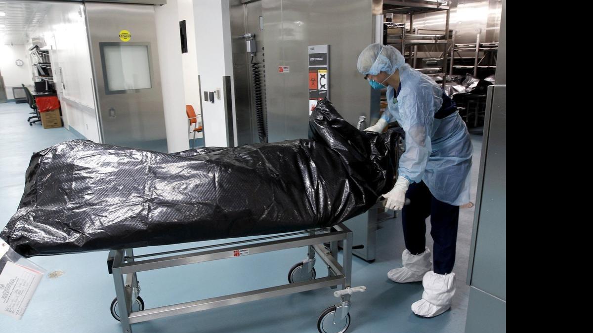 
An autopsy technician at the morgue in Raleigh.
