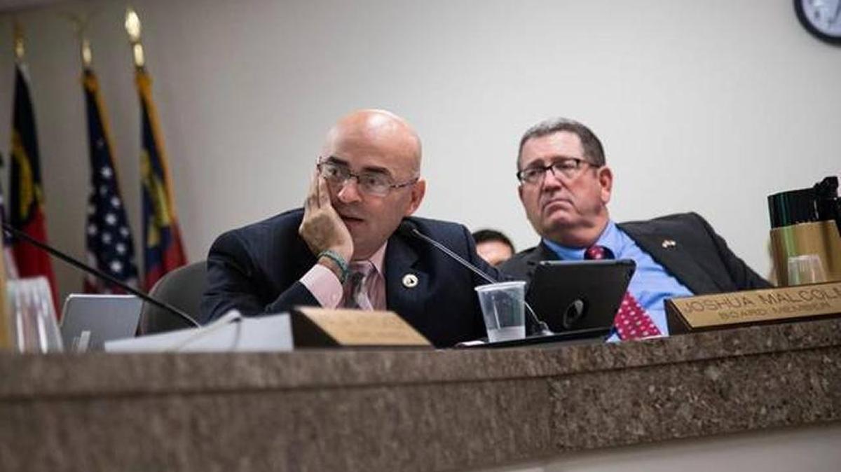 State Board of Elections members Joshua Malcolm, left, and A. Grant Whitney Jr. at a September meeting.