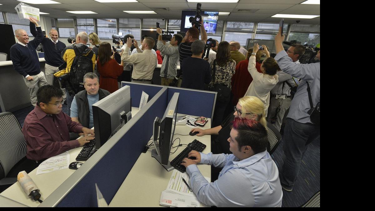
Dozens of gay couples waited last October at the Mecklenburg County Register of Deeds office to get marriage licenses. 
