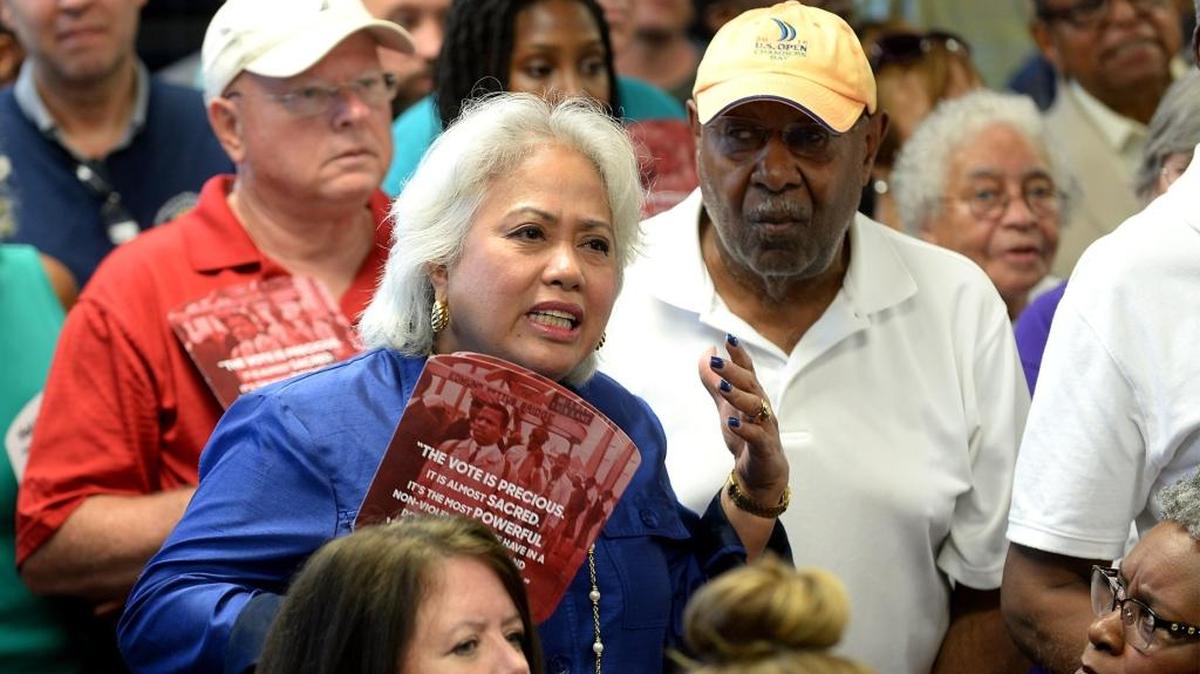 Scores of concerned citizens jammed a Mecklenburg County elections meeting last month.