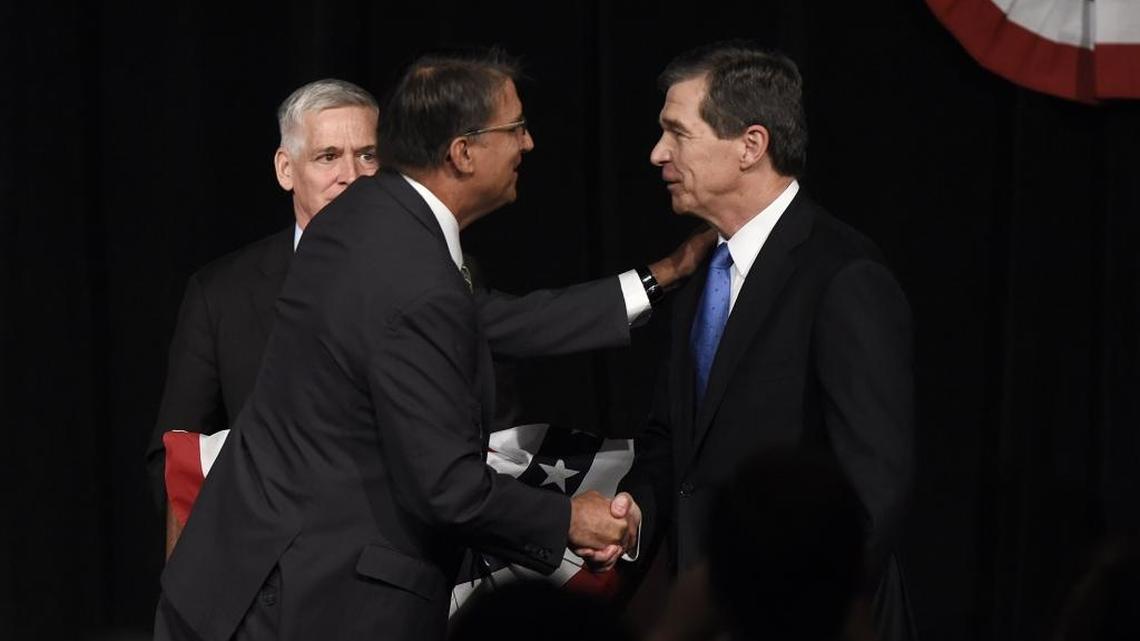 Republican Pat McCrory and Democrat Roy Cooper at a Charlotte gubernatorial debate in June.