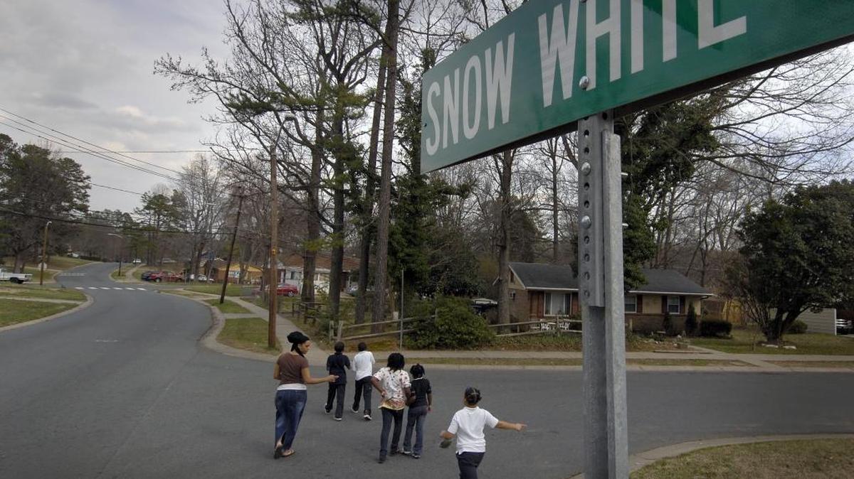 
Youngsters from the Hidden Valley Youth Center are escorted along Snow White Lane in 2009.
