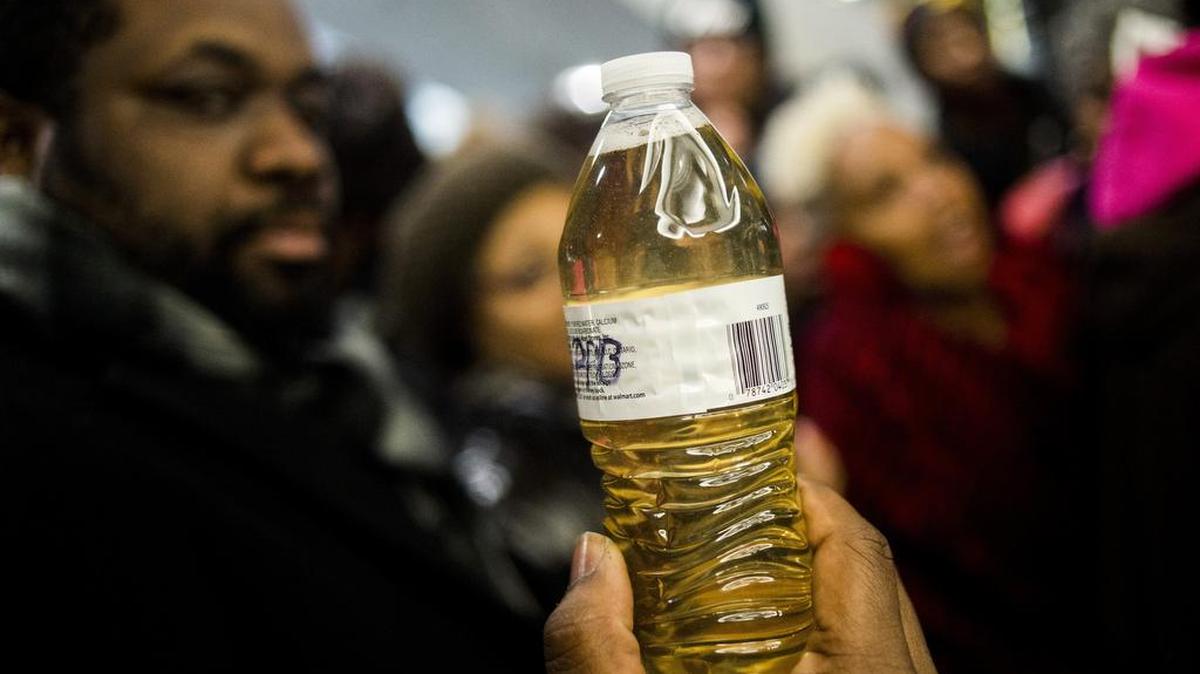 A bottle of Flint water at a protest this month near Michigan Gov. Rick Snyder’s office.