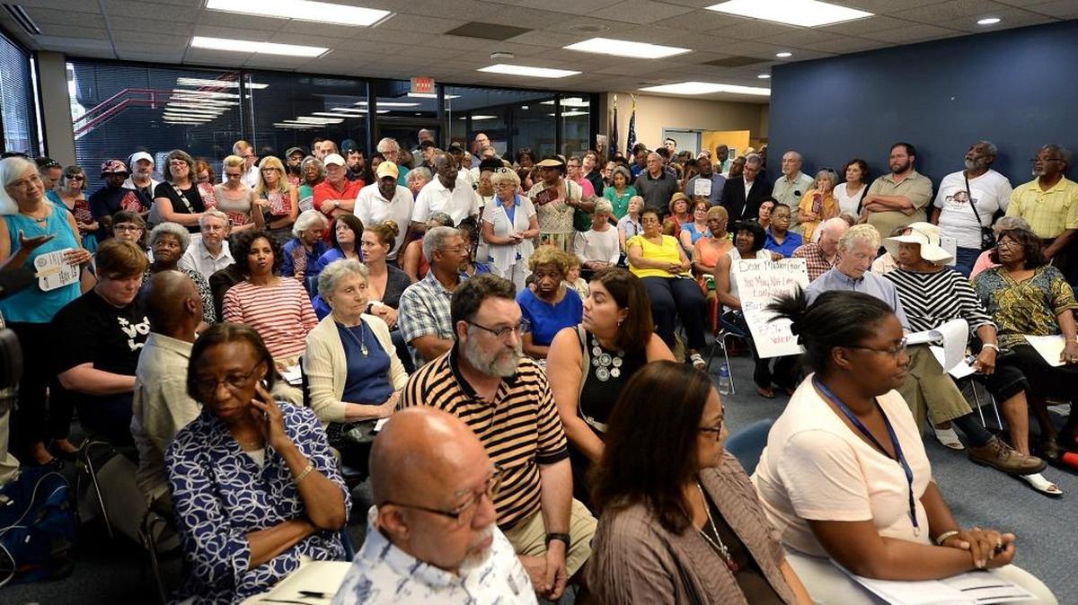 Citizens pack the Mecklenburg Board of Elections office on Monday afternoon.