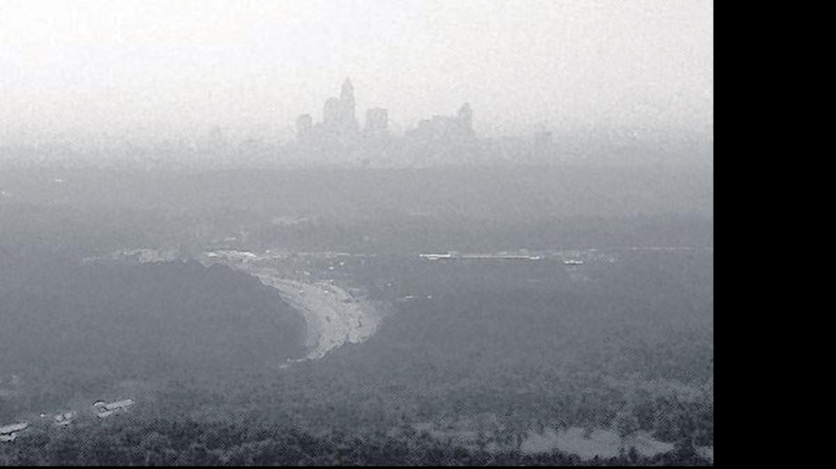 Air pollution like this in Charlotte in 2002 helped prompt North Carolina to become a model in air quality legislation.