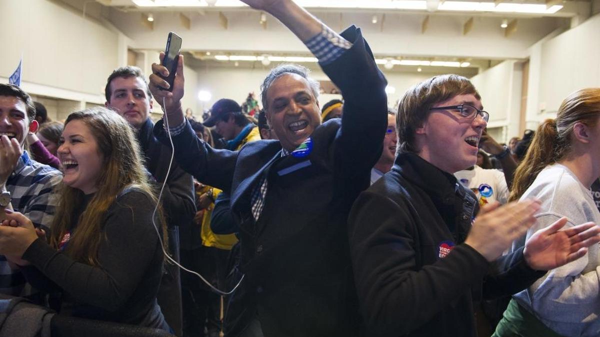 Supporters celebrate news that Democrat Ralph Northam won the gubernatorial election Tuesday in Virginia.