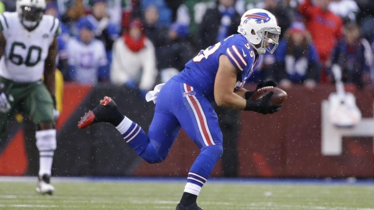 Buffalo Bills linebacker AJ Tarpley makes an interception in January against the New York Jets.
