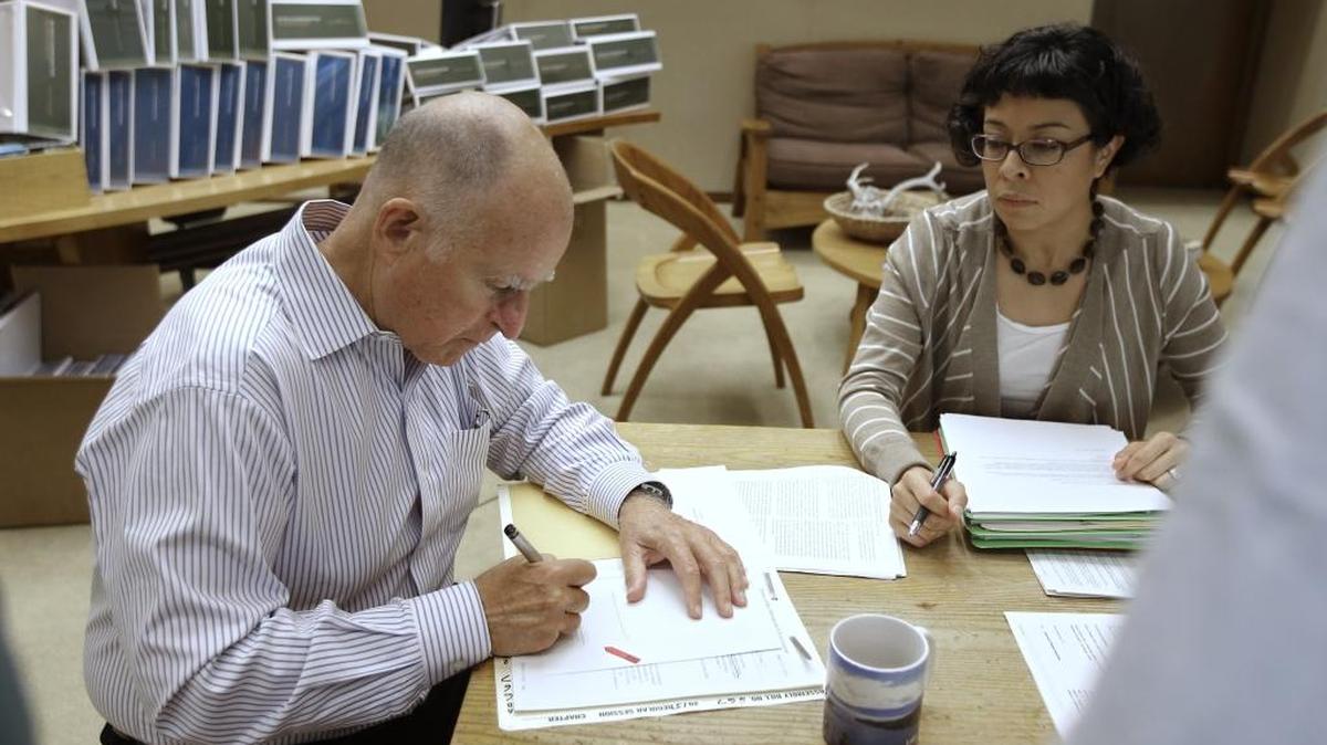 
California Gov. Jerry Brown signs bills into law last week.
