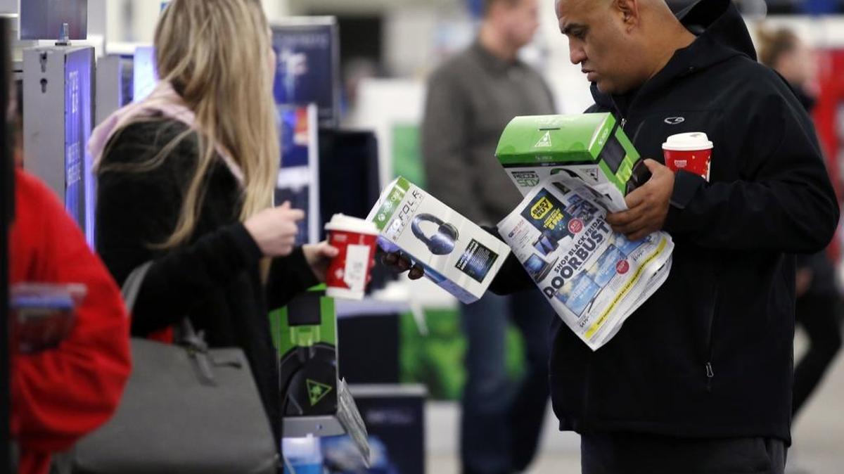 Shoppers at a Best Buy in Illinois.