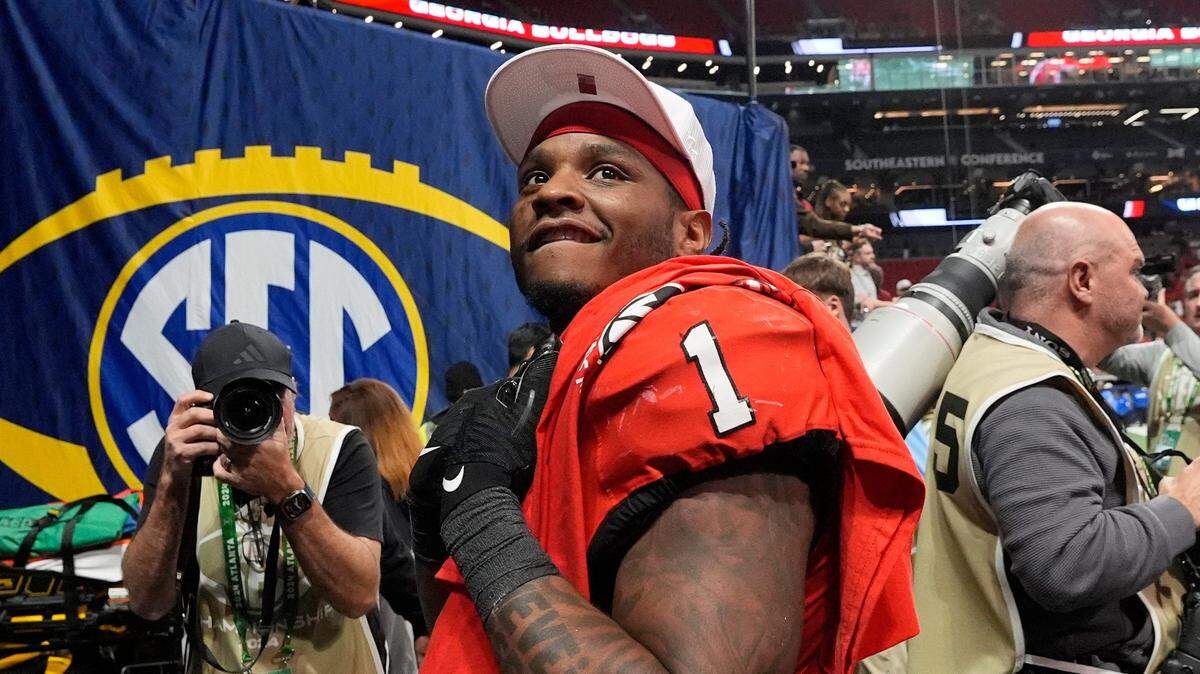 Georgia running back Trevor Etienne (1) celebrates after the winning the SEC championship game against Texas in Atlanta, on Saturday, Dec. 7, 2024. Georgia won 22-19.