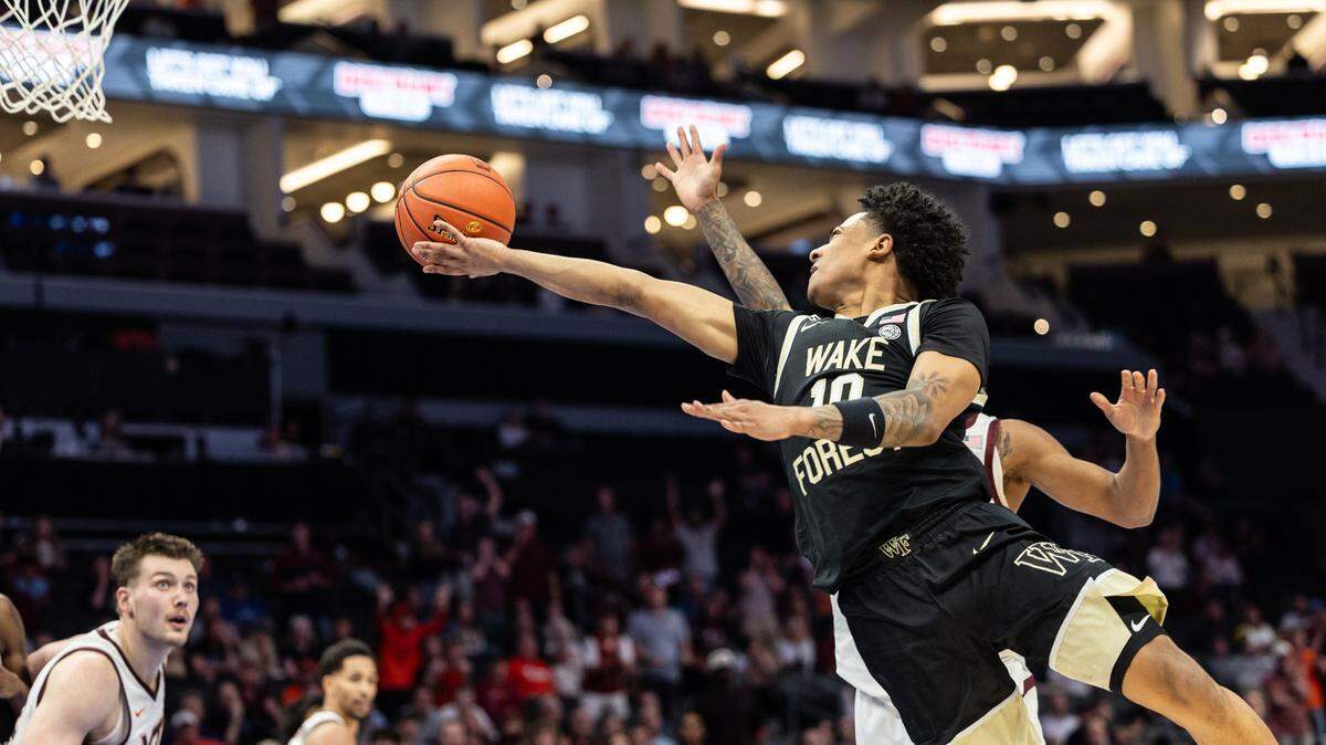 Wake Forest Demon Deacons guard Sebastian Akins shoots against the Virginia Tech Hokies during the ACC men's basketball tournament in Charlotte, N.C., on Tuesday, March 10, 2026. 
