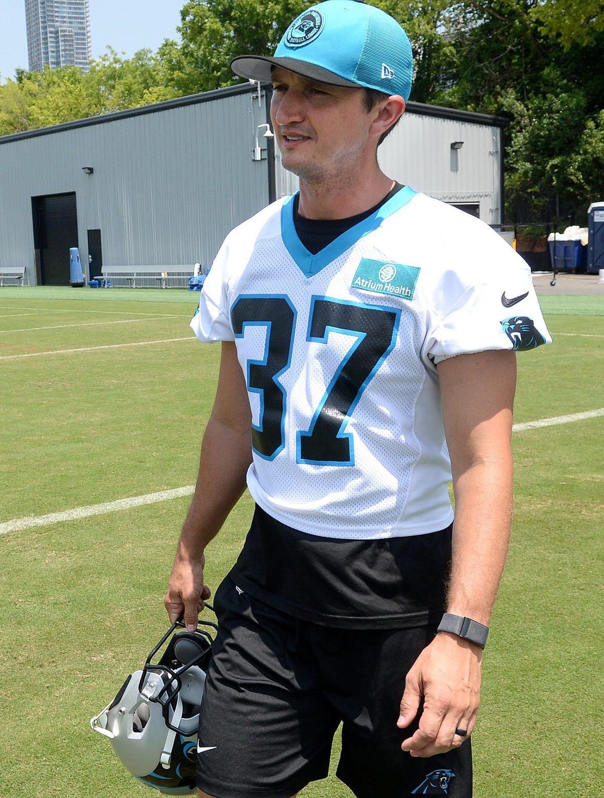 Matthew Wright, #37, a Panthers kicker, heads off to the locker room after practice. The Carolina Panthers, in their second week of organized team activities, ran through drills on Tuesday, June 3, 2025 at their practice facility in uptown Charlotte.