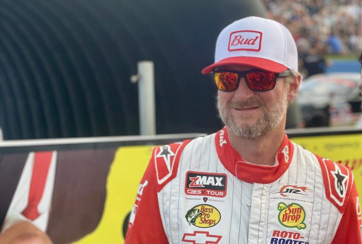 Dale Earnhardt Jr. hangs out on pit road ahead of the late model stock car race by the CARS Tour on Saturday, August 16, 2025, at Anderson Motor Speedway, where he showed off a throwback paint scheme.